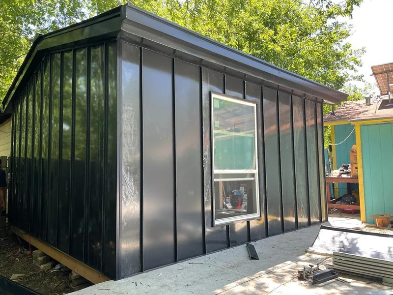 Black standing seam metal wall panels for Roof Inspection in Brownstown