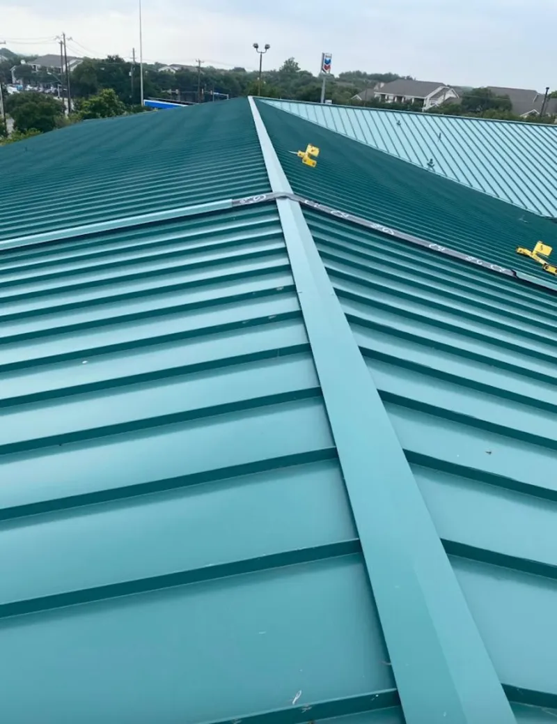 Green commercial metal roof ridge and valley for Metal Roof Repair in Brownstown